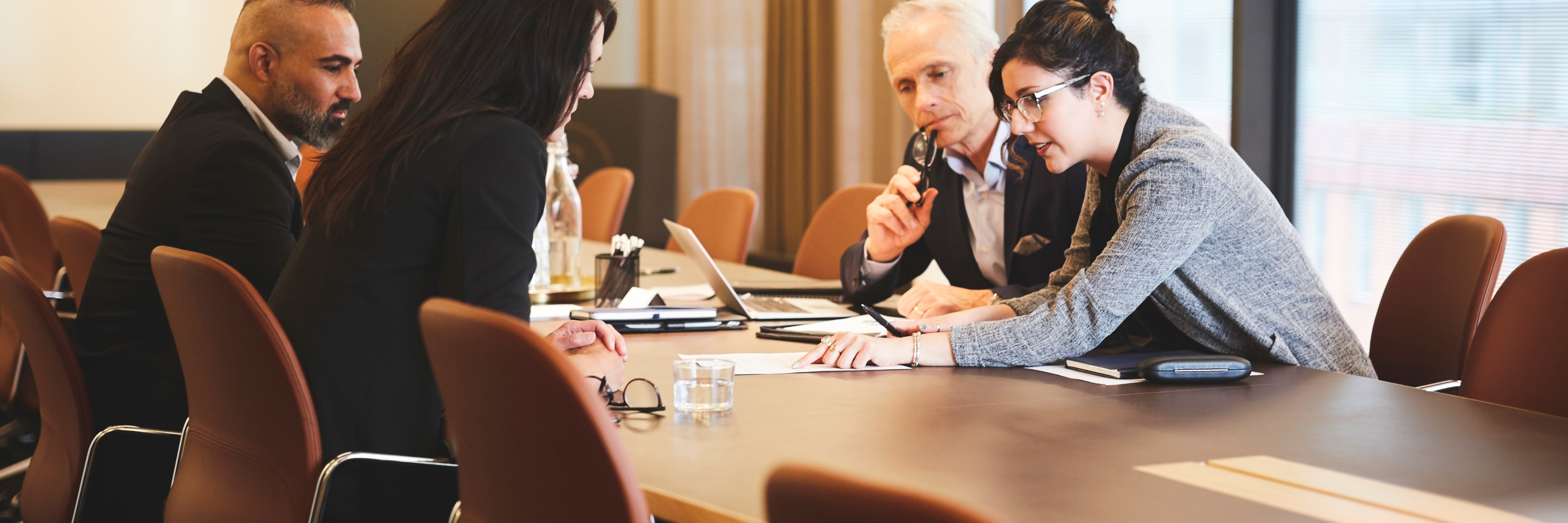 Lawyers discussing a document