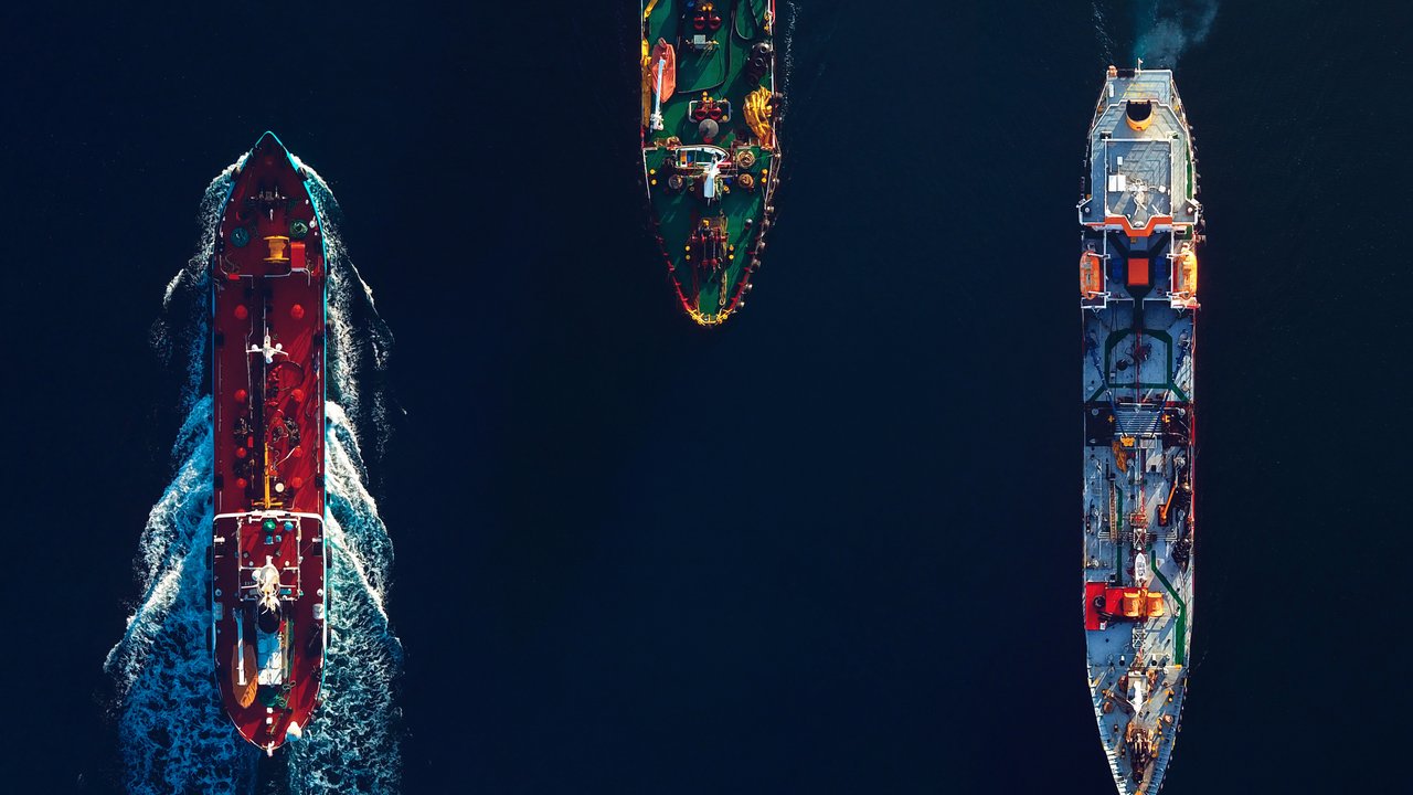 Aerial View of Three Cargo Ships at Sea Ocean Marine Cargo Insurance